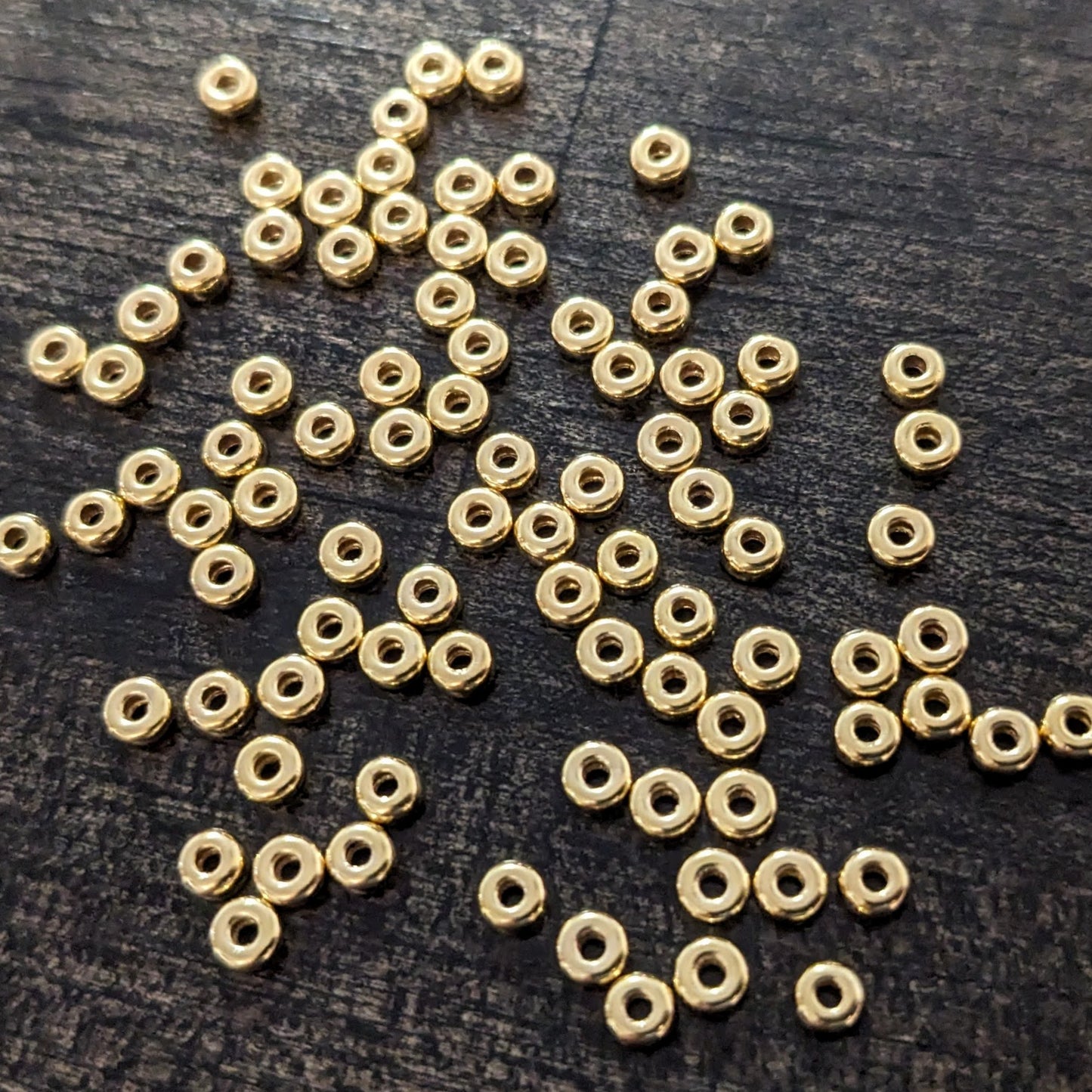 3mm Roundel Seamless Beads in 14kt gold filled, 0.9mm hole - sold in sets of 10