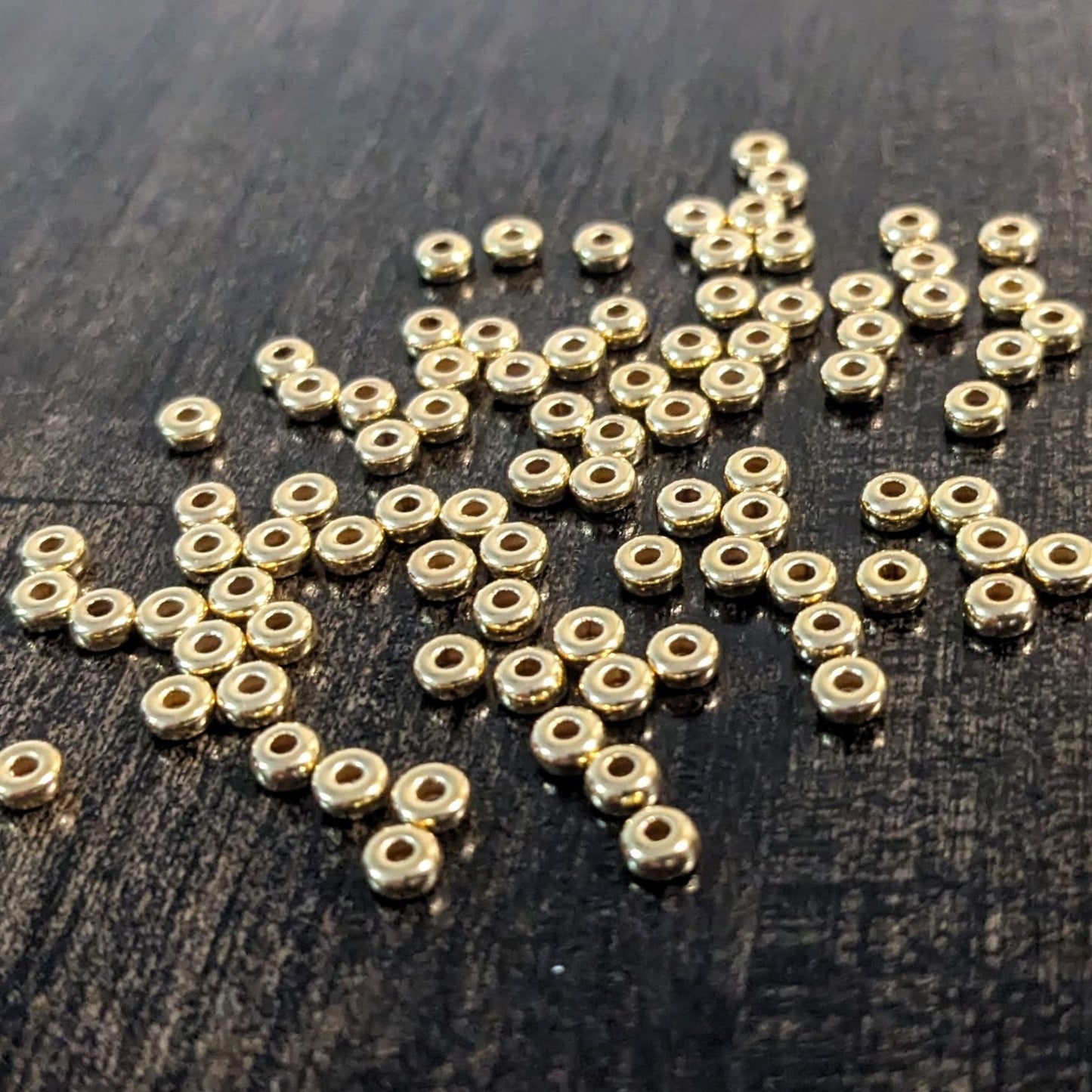 3mm Roundel Seamless Beads in 14kt gold filled, 0.9mm hole - sold in sets of 10