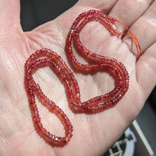 Padparadscha Red Sapphire Faceted Rondelles, 2 inch strand